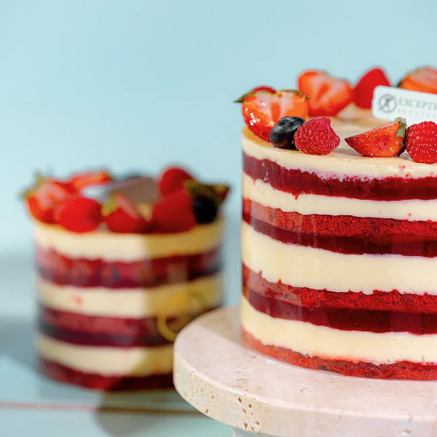 A red velvet cake layered with cream and berries, from Exception Sweets