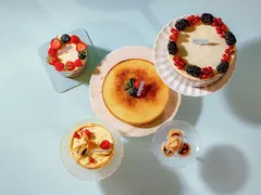 A spread of Exception Sweets cakes and tarts, shot from above