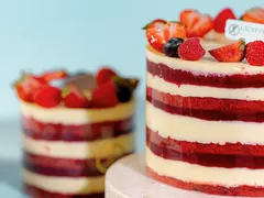 A red velvet cake layered with cream and berries, from Exception Sweets
