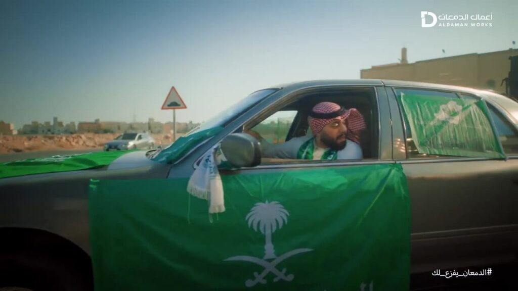 From the campaign film: the national flag on the car